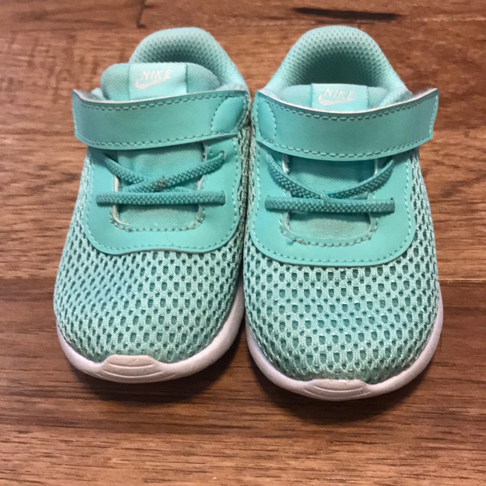 Teal Nike walking shoes
